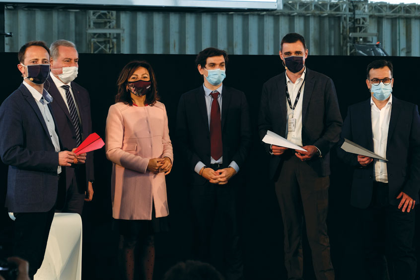 Jérémy Caussade, President and co-founder of Aura Aero; Jean-Luc Moudenc, Mayor of Toulouse; Carole Delga, President of the Occitanie region, Romain Gareau, Sub-prefect of Occitanie in charge of recovery, Wilfried Dufaud, co-founder of Aura Aero; Fabien Raison, co-founder of Aura Aero.