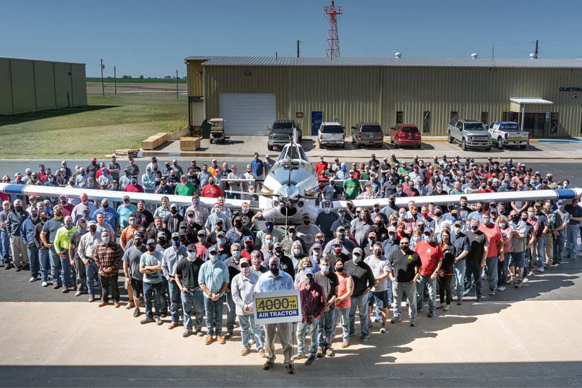 Employee-owners at aircraft manufacturer Air Tractor, Inc. celebrate the delivery of their 4,000th aircraft.