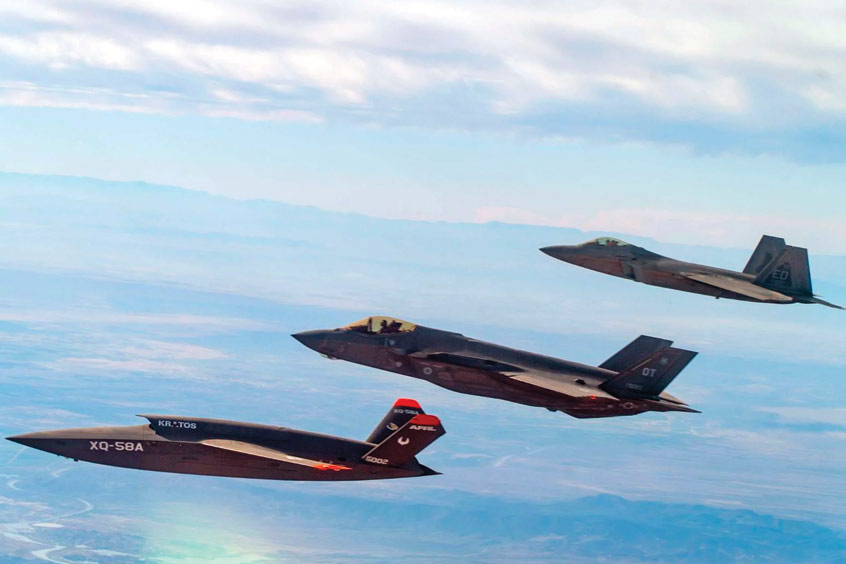 XQ-58A Valkyrie, F-35 Lightning II, and F-22 Raptor fly in formation. (Photo: Kratos Defense & Security Solutions, Inc.)