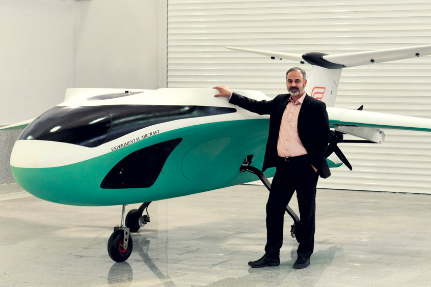 Samad Aerospace CEO Seyed Mohseni with the half-scale eStarling prototype. (Photo: Samad Aerospace)