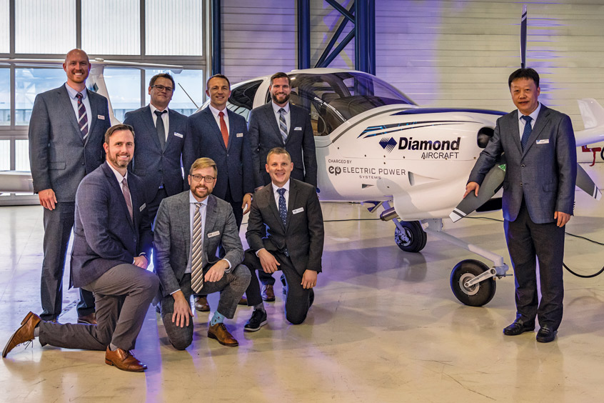 Front row, Michael Armstrong, CTO, EPS; Michael Duffy, VP of product, EPS; Steven Hall, director of product management, EPS; back row, Kevin Spencer, VP of programs, EPS; Robert Kremnitzer, head of design organisation, Diamond Aircraft Austria; Nathan Millecam, CEO, EPS; Scott McFadzean, CEO, Diamond Aircraft Canada; Li Yu, COO, Diamond Aircraft Austria.