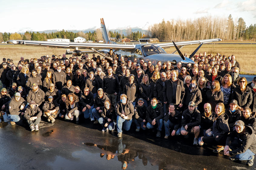 The Daher production team at Sandpoint, Idaho is shown with their milestone 300th Kodiak aircraft prior to its delivery.