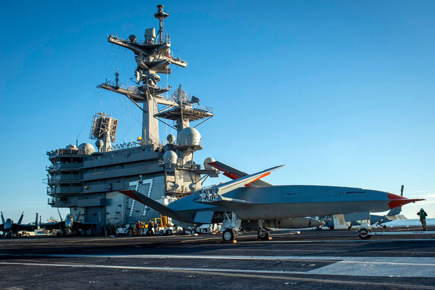 An MQ-25 Stingray test asset conducts deck handling maneuvers Dec.12 while underway aboard USS George H.W. Bush (CVN -77). This unmanned carrier aviation demonstration marked the first time the Navy conducted testing with the MQ-25 at sea. (Photo: U.S. Navy)