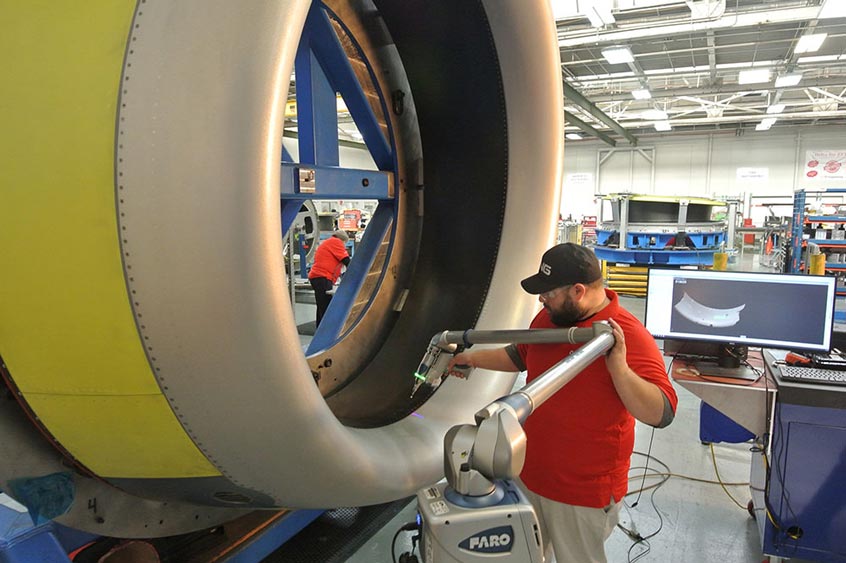An inlet for the C919 nacelle system is inspected at Middle River Aerostructure Systems’ production facility prior to shipment.