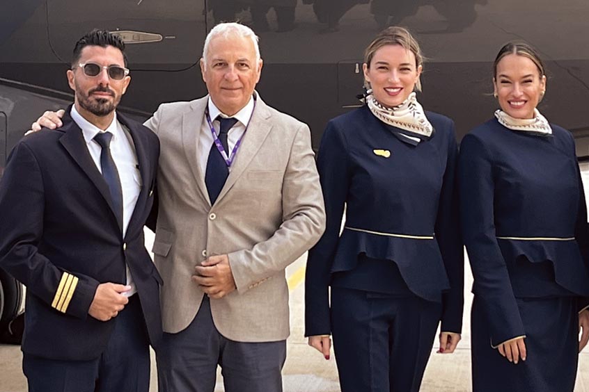 First officer Konstantinos Flamis, accountable manager Simon Roussos, cabin crew manager Katerina Nikolaidou and cabin crew member Violeta Raseva welcome the air ambulance Challenger 605 to Athens.