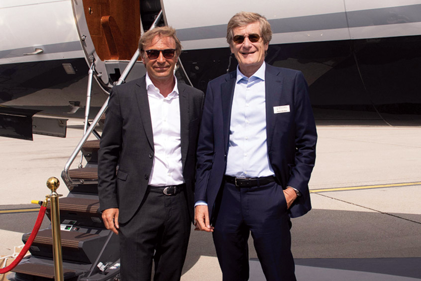 President Dominique Trinquet with chairman and founder Thierry Boutsen.