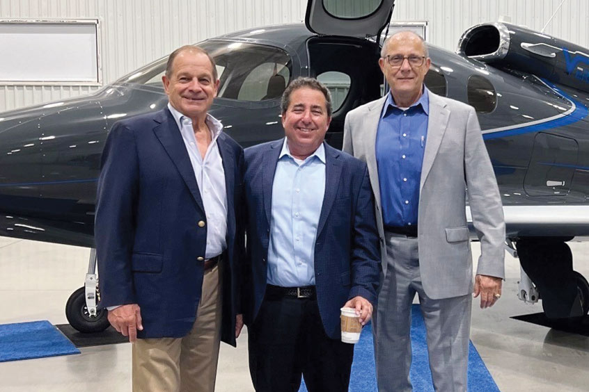 Don Dodson, Richard Kane and Peter Pahygiannis with one of the new SF50s from Cirrus Aircraft.