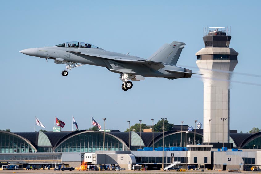 A Boeing-built F/A-18 Super Hornet takes off from Lambert International Airport in St. Louis. Boeing will continue to deliver new Block III Super Hornets to the Navy through 2025.