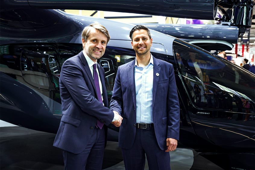 Safran CEO Franck Saudo and Archer CEO Adam Goldstein in front of Archer's Midnight Aircraft.