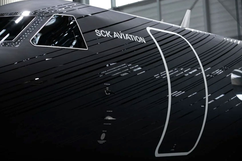 The aircraft received diagonal glossy black stripes on the matt background, from the nose section to the rear of the fuselage.