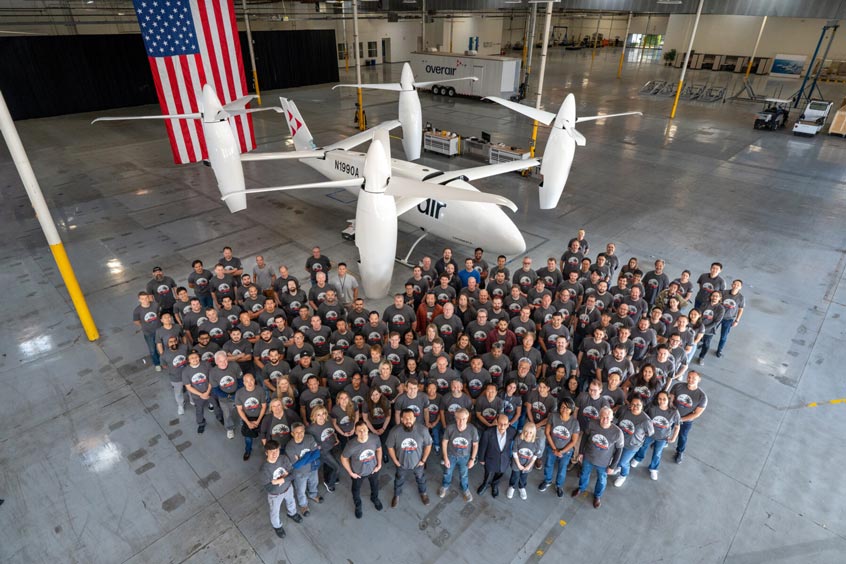 Overair employees celebrate the completion of their first full-scale prototype.