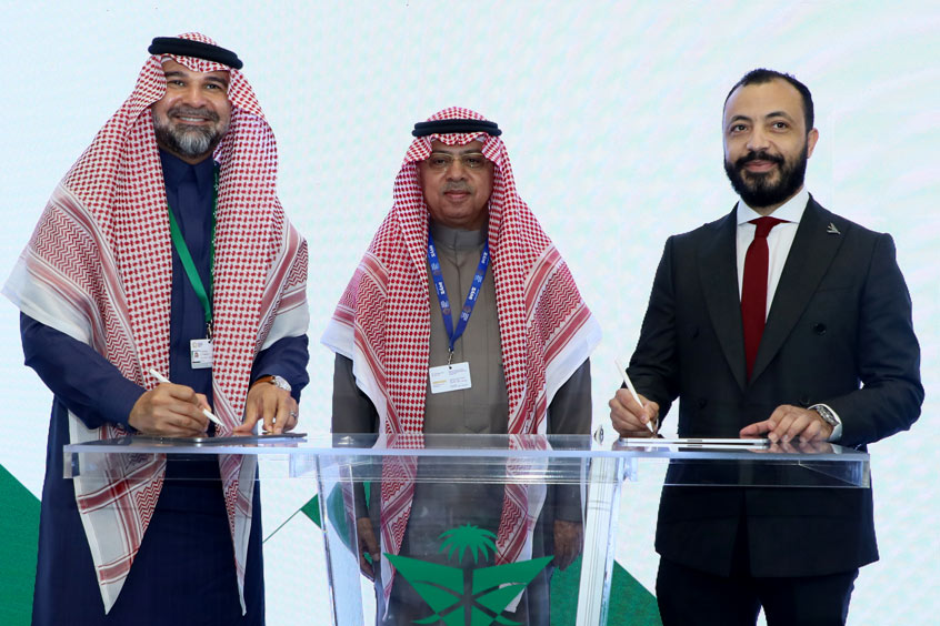 The agreement is signed by Saudia Technic CEO Capt Fahd Cynndy and Embraer Services & Support regional sales director Rida Amara, in the presence of His Excellency President of the GACA Abdulaziz Al-Duailej, centre.