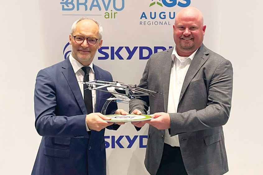 SkyDrive chief development officer Arnaud Coville with Bravo Air VP operations Dann Standard.