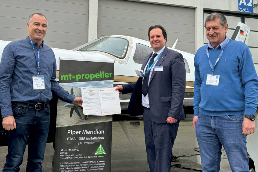EASA manager Marco Capaccio hands over the STC to general manager and test pilot Martin Albrecht (left) and chief engineer and test pilot Josef Eberl.