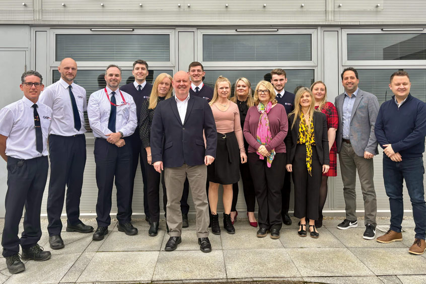 Managing director Sean Raftery, centre, with the Universal Aviation UK team.