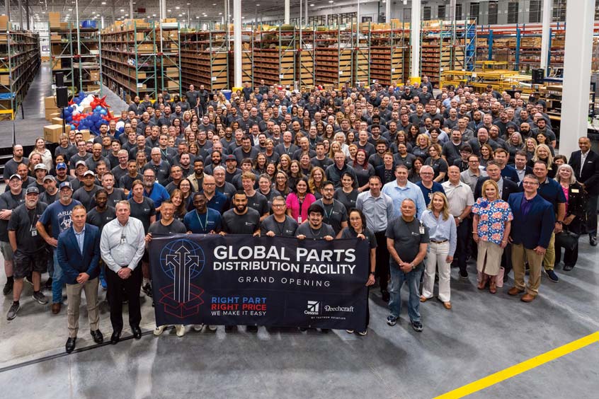 Textron Aviation employees celebrate the grand opening of the global parts distribution facility at headquarters in Wichita, Kansas.