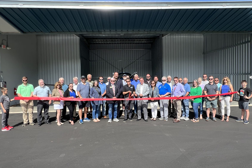 Leaders from the City of Hickory and Burke County were joined by state legislative officials at Hickory Regional airport to celebrate the grand opening of 12 T-hangars on the north ramp.