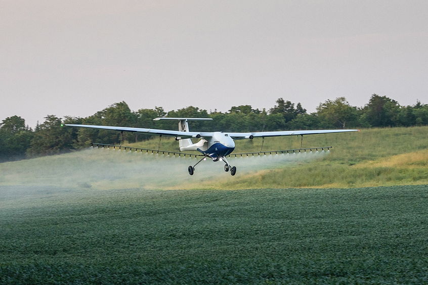 Pyka Pelican Spray in flight over a crop in the United States.