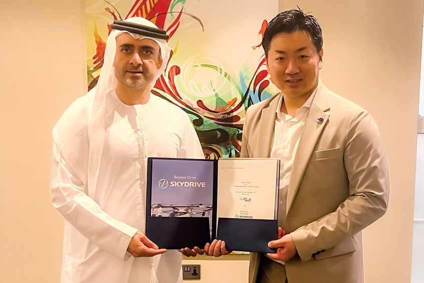 Fahad Mohammad Mir Hashem Khoory, CEO of AeroGulf Service, with Keisuke Yasukochi, global intelligence officer at SkyDrive.
