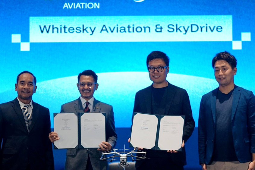 Whitesky Group CFO Luthano Harry Budyanto, CEO Denon Prawiraatmadja, SkyDrive CEO Tomohiro Fukuzawa, and SkyDrive director Taiju Oki at HELI EXPO ASIA 2025, Cengkareng Heliport, Tangerang.