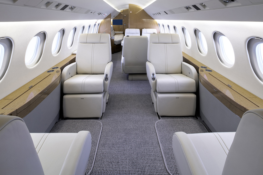 Cool greys and off-whites were selected for soft goods to create a spacious, airy atmosphere.