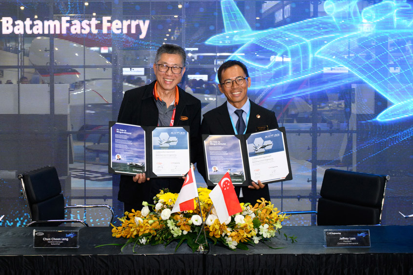 Chua Choon Leng, General Manager, BatamFast (left) and Jeffrey Lam, President Commercial Aerospace, ST Engineering (right), at the signing ceremony to introduce AirFish Voyager to the ferry route between Singapore and Batam, Indonesia, at the Singapore Airshow 2026.