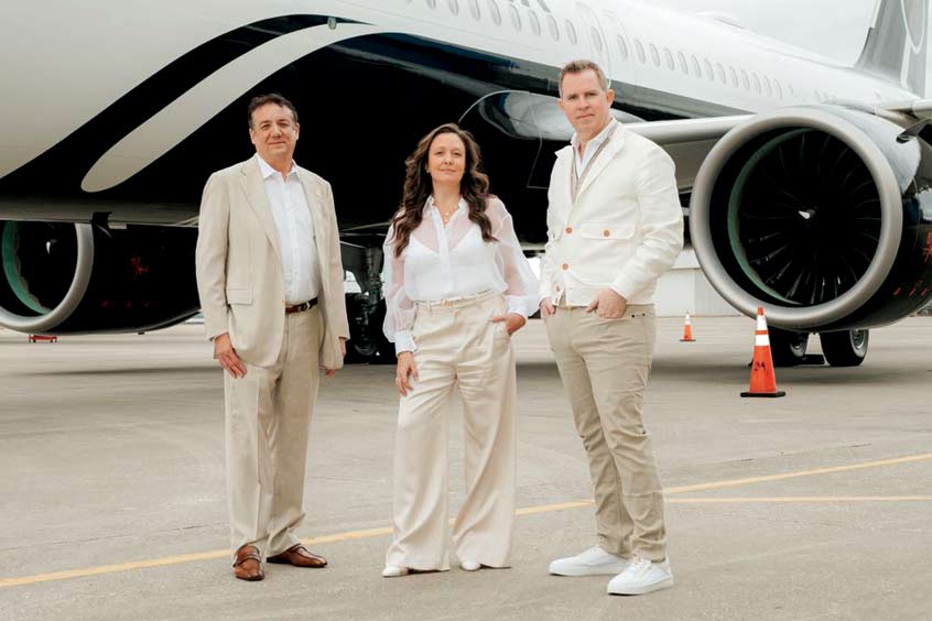 Co-founder and CEO Wade Black (L) and his senior leadership team introduce the first aircraft.