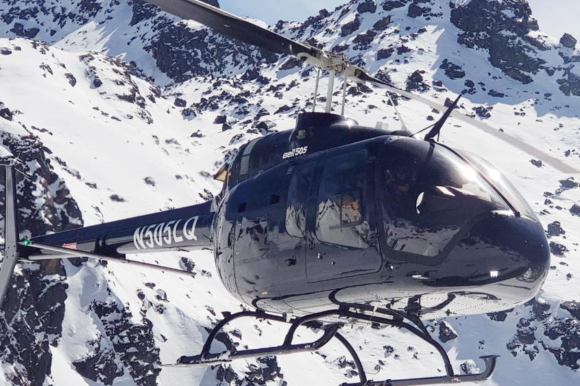 Bell 505 Jet Ranger X operating at high altitude.