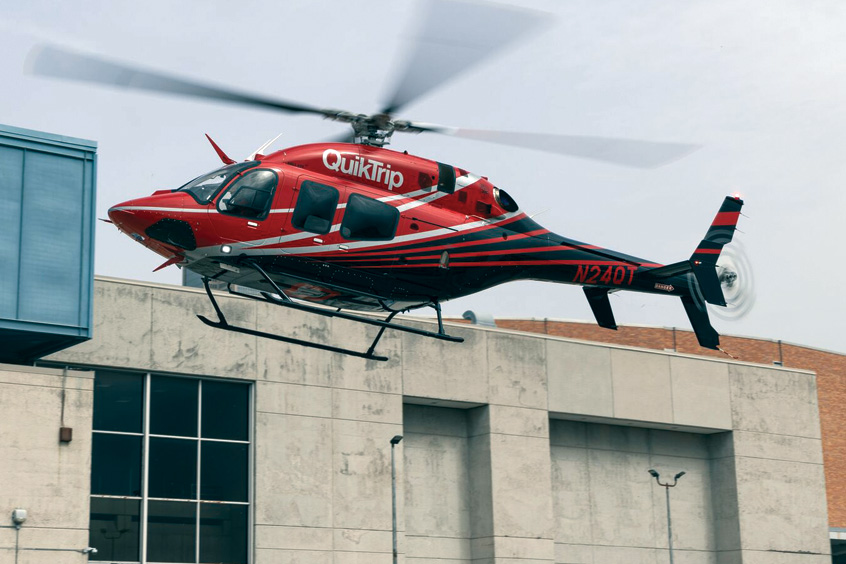 A Bell 429 helicopter configured for corporate transport.