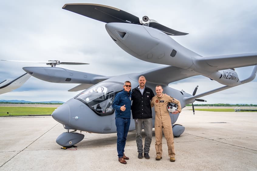 U.S. Transportation Secretary Sean P. Duffy with Beta Technologies President and CEO Kyle Clark and experimental test pilot Nate Moyer.